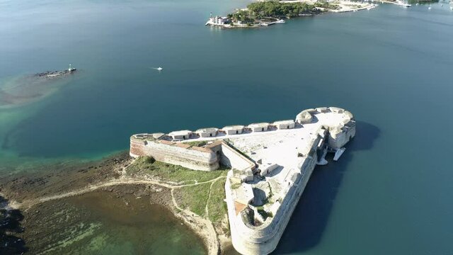 Aerial View Of St. Nicholas Fortress At St. Anthony Channel Overlooking Svjetionik Jadrija In The Distance Near Sibenik, Dalmatia, Croatia.
