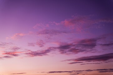This image shows a colorful purple sunset sky cloudscape.
