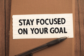 Stay focus on your goal, text words typography written on paper, life and business motivational inspirational
