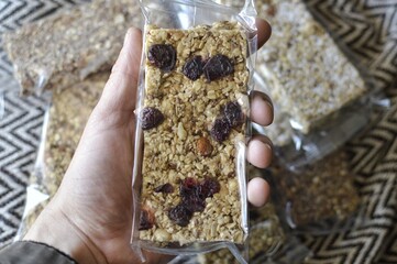 Artisan cereal bar with cranberry raisins