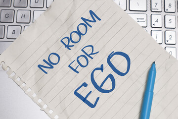 No room for ego, text words typography written on paper against computer keyboard, life and business motivational inspirational