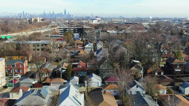 Slider Right View of Houses in the Suburbs and Chicago Skyline in the Background