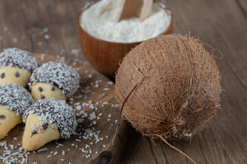 Fototapeta na wymiar Hedgehog cookies with chocolate topping and coconut powder