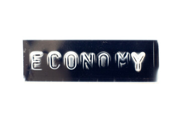 Embossed letter in word economy on black banner with white background
