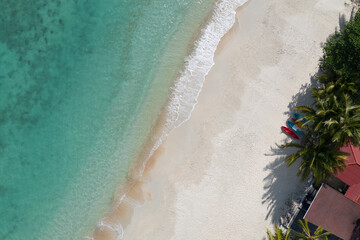 aerial shot of tropical paradise beach with no people on it
