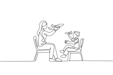 One continuous line drawing of young mother and her daughter sitting on chair and playing airplane toy together at home. Happy family parenthood concept. Single line draw design vector illustration