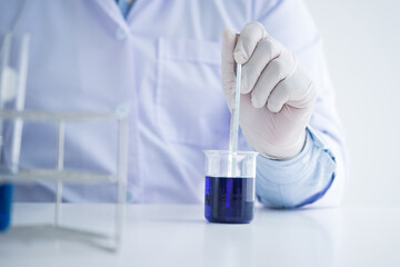 Science experiment. Health care researchers working in life science laboratory