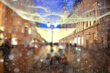 abstract blurred background, landscape christmas snow city street falling snowflakes, holidays winter