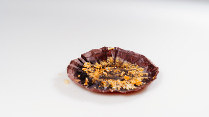 fifth. series of six photos.eating Chocolate cupcake with cream.white background