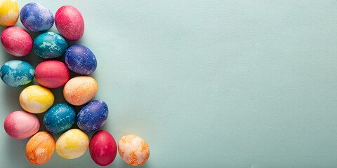 Fototapeta na wymiar Painted Easter eggs on a blue background