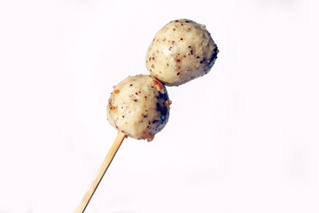 Japanese oden 2 black pepper fish ball, chicken meatball, isolated white meatball delicious yummy fish ball on stick seafood street food