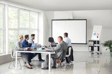 Business people having meeting in office