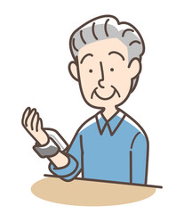 血圧をはかるおじいさん　手首式測定機