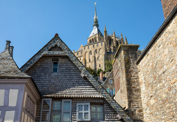 Fototapeta premium Ancient buildings of the old town on the famous Mont Saint Michel island in France