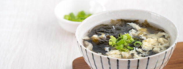 Homemade delicious seaweed egg drop soup in a bowl.