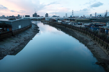 Fototapeta na wymiar River Lea in East London leading towards Stratford in the evening.
