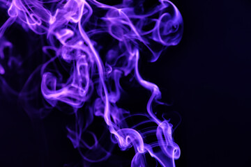 Obraz premium Color smoke on dark background