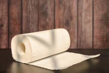 paper roll for kitchen near a window in a sunny morning
