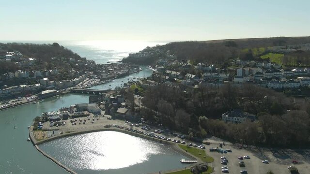 Rising aerial over Looe, cornwall on an early spring sunny day.