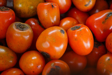Colorful persimmons in a small market at Vietnam.