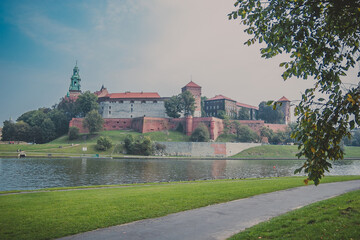 The Wawel royal Castle in Krakow, Poland. Built at the behest of King Casimir III the Great. The castle was one of the largest in Poland. View from across the river Vistula, Wisla.