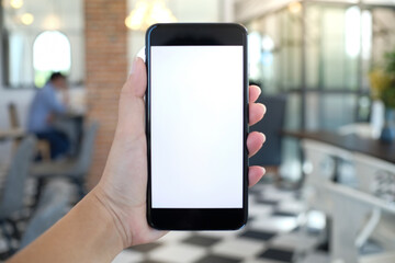 Close up of women's hands holding cell telephone blank copy space screen. smart phone with technology concept