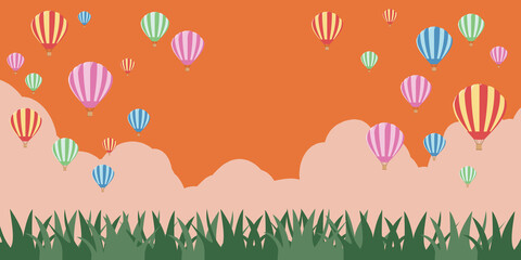 気球　草原　夕空