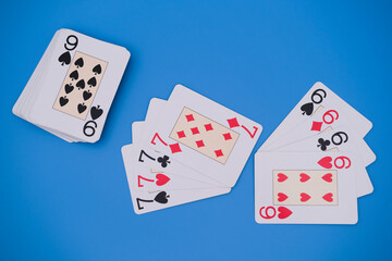 Playing cards on blue background
