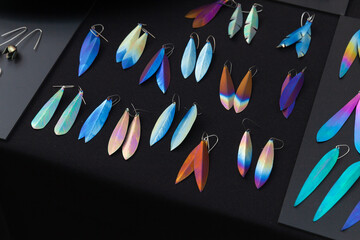 Assortment of earrings with colorful titanium oxide patterns