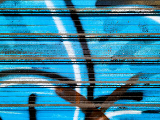 Close-up of urban graffitis painted on the wall for  your creative design