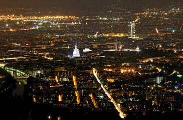 lights of the city of turin in Italy seen from above