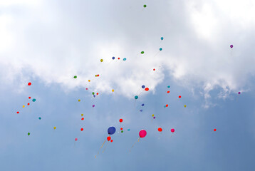 balloons fly high in the sky after the big celebration