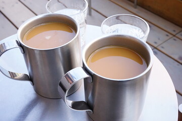 Silver cup of coffee on the table - コーヒー 銀のカップ	