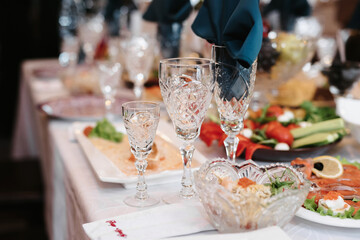 festive table in the restaurant with wine glasses