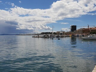 clouds over the marina of split, croatia