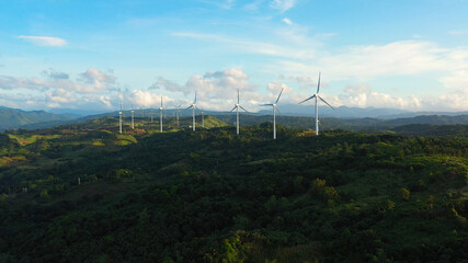 Aerial view of wind turbines and wind mills for electric power production in the Philippines, Luzon.