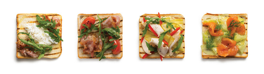 Set of toasts with meat, chicken, fish, herbs and pickled vegetables
