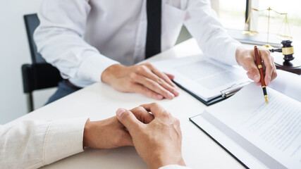 Lawyer discuss the contract and legal document agreement in office. Law and legal concept.