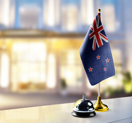New Zealand flag on the reception desk in the lobby of the hotel