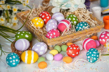 Hand painted pastel colored Easter eggs background. Happy Easter greeting card or invitation.