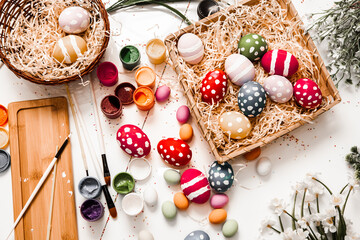 Hand painted pastel colored Easter eggs background. Happy Easter greeting card or invitation.