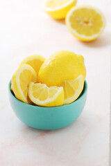 A bowl with yellow bright lemons