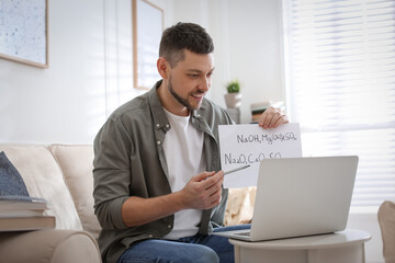 Teacher conducting online lesson at home during COVID-19 quarantine