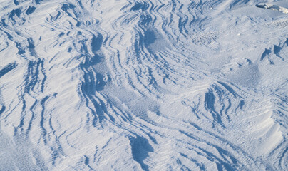Fototapeta na wymiar Natural abstract background. Snow surface.