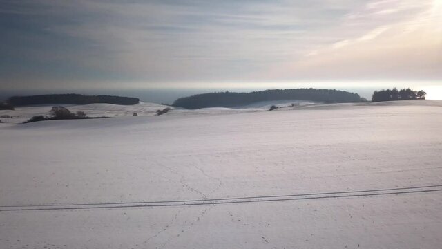 aerial snowy landscape footage from mols bjerge and djursland located in central denmark