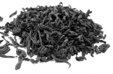 Dry tea isolated on white with blur effect in black and white.