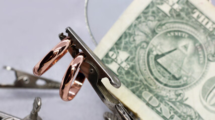 A gold ring and dollars in a pawn shop, ,macro