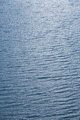 Blue tropical sea surface with waves and ripples