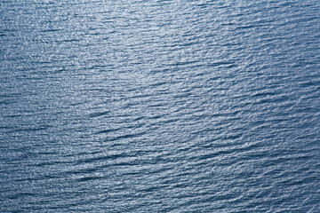 Blue tropical sea surface with waves and ripples