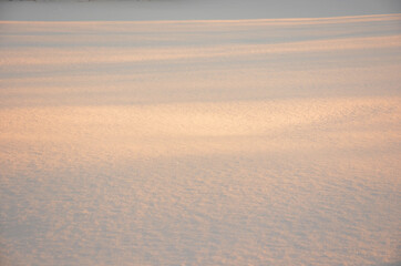 Snow at sunset. Snow. Winter. Background.